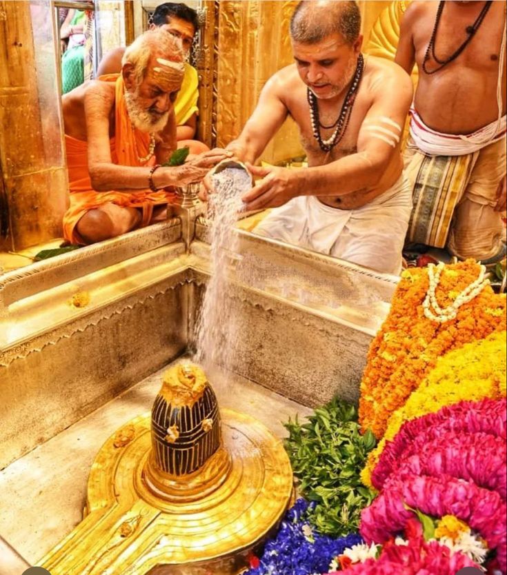 A serene Shivling during an Abhishekam ceremony